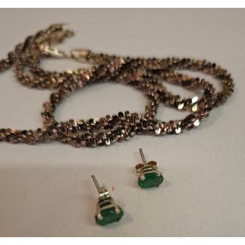 126 - An Italian silver necklace with matching bracelet together with a pair of earrings with green glass ... 