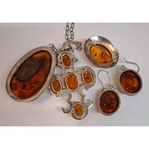 128 - A suite of white metal and amber effect jewellery, not hallmarked and previously tested negatively f... 