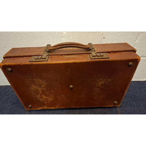 137 - A mid 20th Century brown leather Revelation suitcase with 'Knowles', the name of original owner, emb... 