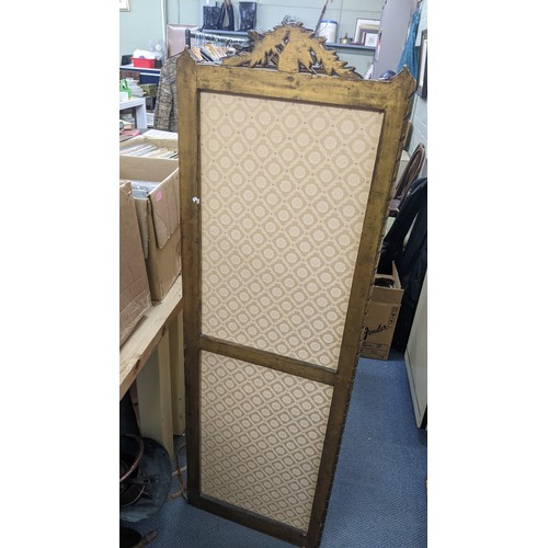 90 - A late 19th century French gilt folding three fold screen, having beige upholstery panels surrounded... 