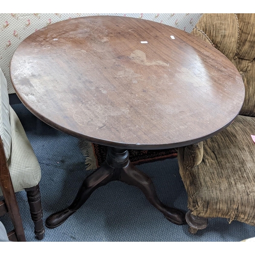 145 - A George III mahogany snap top occasional table on a three cabriole legs 67.5h x 74w
Location: A4B
I... 