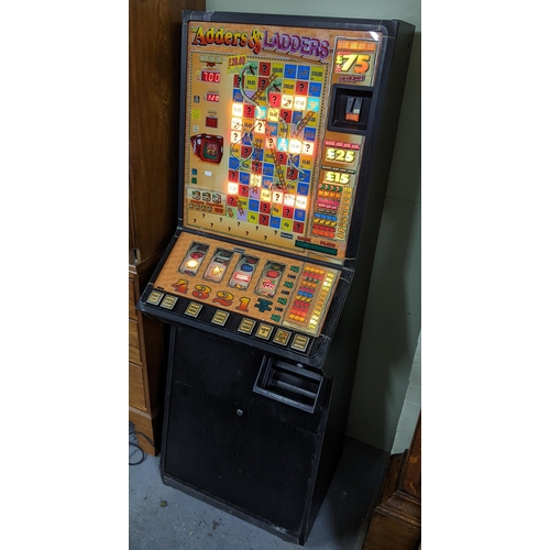 159 - An Adders & Ladders fruit machine, with original instructions and keys, adders and ladders lights no... 