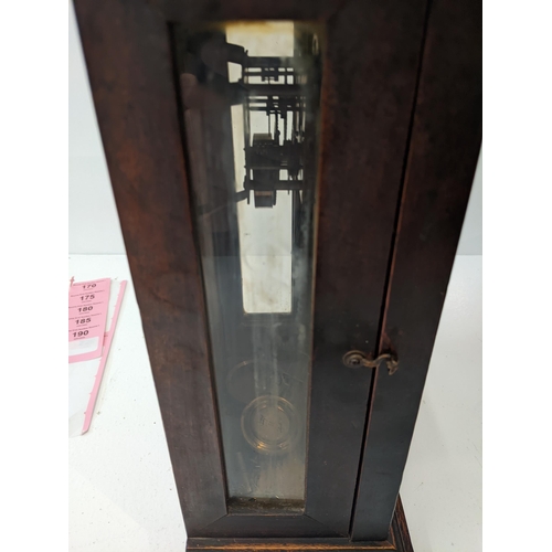 170 - An American cased mantel clock with Roman dial and pendulum marked 'R' and 'A', together with a maho... 