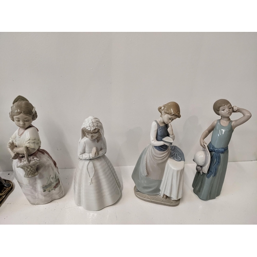 184 - LLadro and nao porcelain figures to include 'Curios girl with straw hat' 'Girl ironing' 'Girl prayin... 