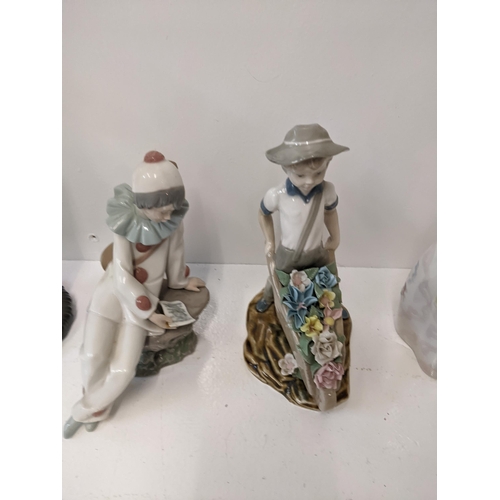 184 - LLadro and nao porcelain figures to include 'Curios girl with straw hat' 'Girl ironing' 'Girl prayin... 