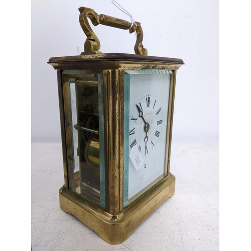 203 - A Charles Frodsham carriage clock, five window brass case, white enamel face with Roman numerals, mo... 