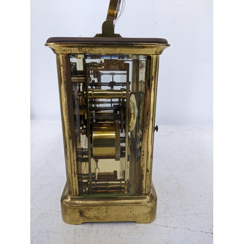 203 - A Charles Frodsham carriage clock, five window brass case, white enamel face with Roman numerals, mo... 