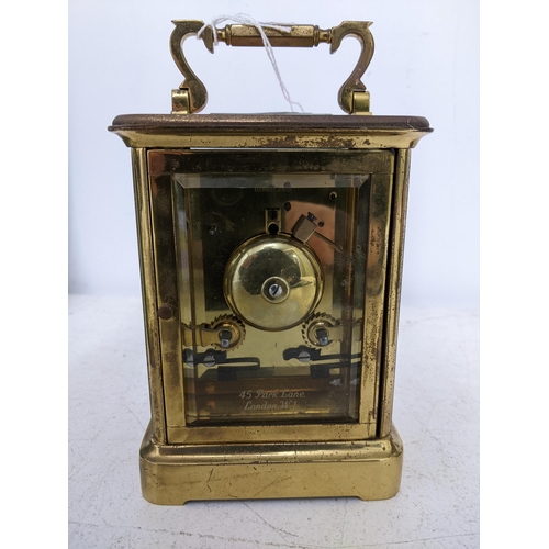 203 - A Charles Frodsham carriage clock, five window brass case, white enamel face with Roman numerals, mo... 