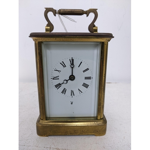 204 - A Charles Frodsham carriage clock, five window brass case, white enamel face with Roman numerals, mo... 