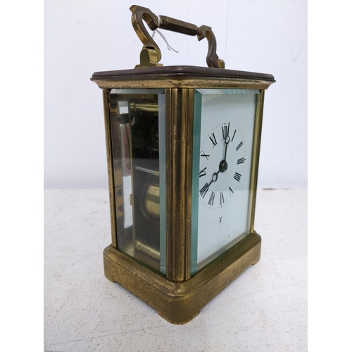 204 - A Charles Frodsham carriage clock, five window brass case, white enamel face with Roman numerals, mo... 