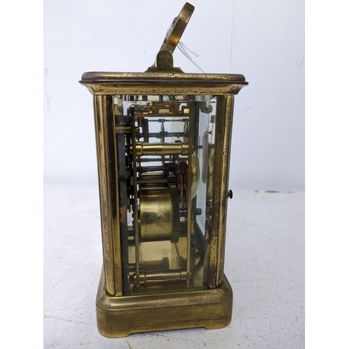 204 - A Charles Frodsham carriage clock, five window brass case, white enamel face with Roman numerals, mo... 