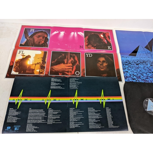 206 - Two Pink Floyd albums to include 'Dark side of the moon' with original posters and sleeve along with... 