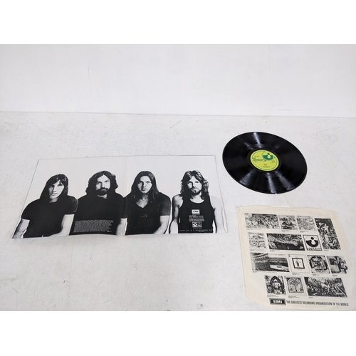 206 - Two Pink Floyd albums to include 'Dark side of the moon' with original posters and sleeve along with... 