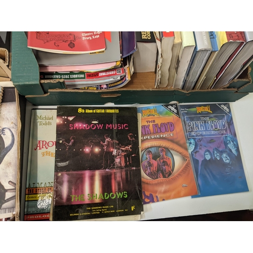 216 - A collection of music-related ephemera to include original Beatles books and sheet music, concert pr... 