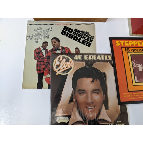 217 - A collection of approx. 60 1950s and 1960s LPs in two vintage cases to include artists such as Yardb... 