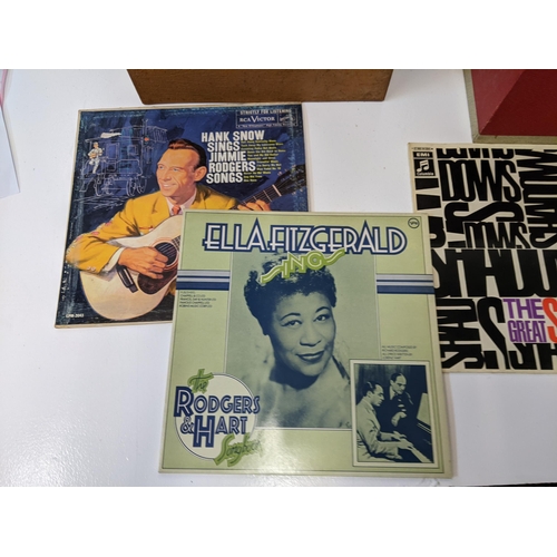 217 - A collection of approx. 60 1950s and 1960s LPs in two vintage cases to include artists such as Yardb... 