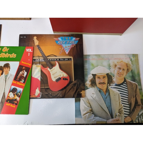 217 - A collection of approx. 60 1950s and 1960s LPs in two vintage cases to include artists such as Yardb... 