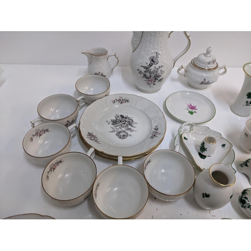 225 - A collection of Augarten porcelain to include vases, candlesticks, dishes and other items, and a Ros... 