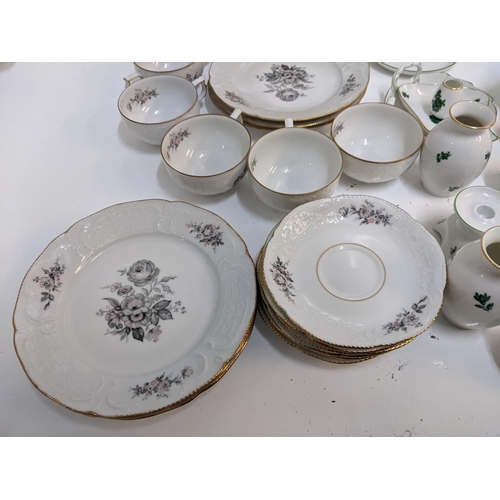 225 - A collection of Augarten porcelain to include vases, candlesticks, dishes and other items, and a Ros... 