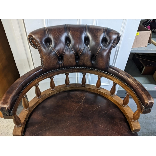 237 - A modern mahogany finished and brown leather upholstered desk chair Location: GR
If there is no cond... 