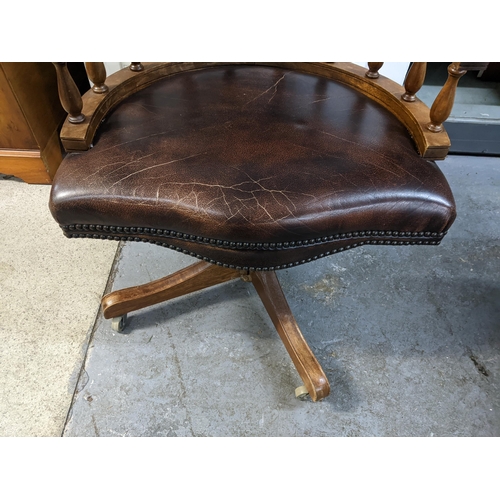 237 - A modern mahogany finished and brown leather upholstered desk chair Location: GR
If there is no cond... 