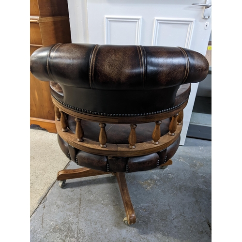 237 - A modern mahogany finished and brown leather upholstered desk chair Location: GR
If there is no cond... 