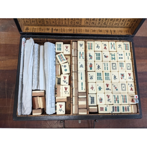 238 - A Chinese Mahjong set in a lacquered case Location: 3.1
If there is no condition report shown, pleas... 