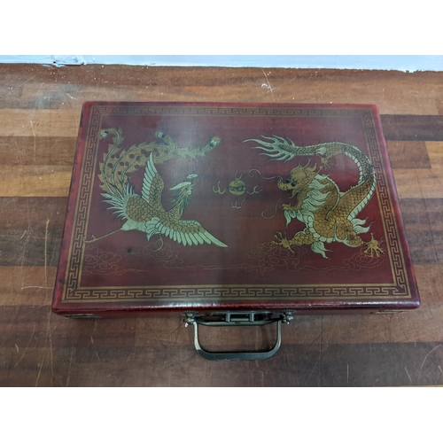 238 - A Chinese Mahjong set in a lacquered case Location: 3.1
If there is no condition report shown, pleas... 