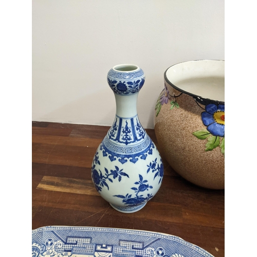 240 - Ceramics to include a Chinese blue and white bottle vase, Royal Doulton character jugs, a Chad Valle... 