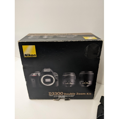 258 - A boxed Nikon D3300 double zoom kit to include a D3300 camera, a AF-S DX zoom - Nikkor 18-55mm lens ... 