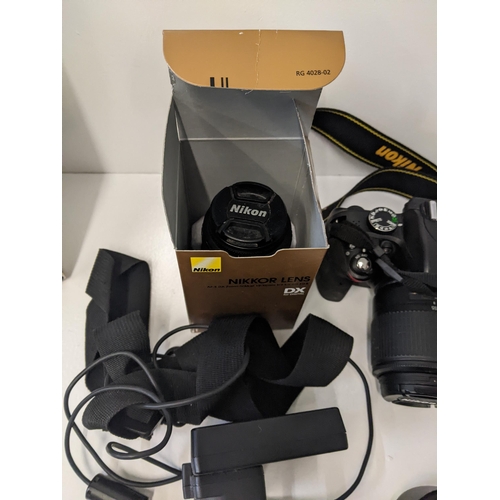 258 - A boxed Nikon D3300 double zoom kit to include a D3300 camera, a AF-S DX zoom - Nikkor 18-55mm lens ... 