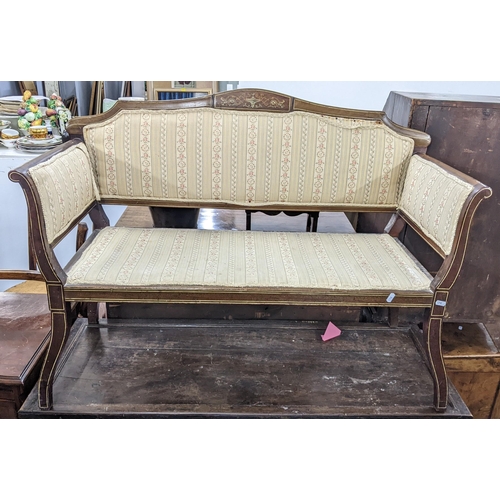 324 - An Edwardian mahogany marquetry inlaid two seater salon sofa, 79.5cm h x 111cm w
Location: A2F
If th... 