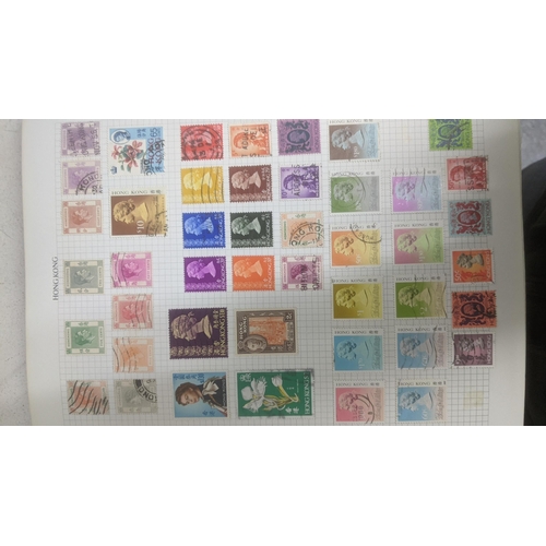 338 - A quantity of stamps from around the world mounted in various albums, some loose, along with various... 