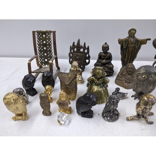 449 - A collection of metal figures and animals including a Chinese bronze figure of an elder, Tibetan Bud... 