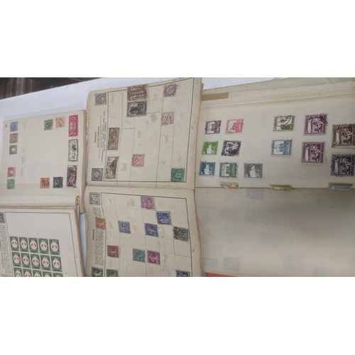 459 - A quantity of world stamp albums and loose examples to include commonwealth examples, Chinese, Frenc... 