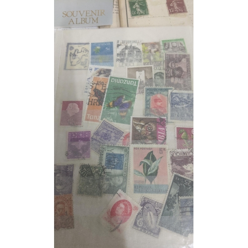 459 - A quantity of world stamp albums and loose examples to include commonwealth examples, Chinese, Frenc... 