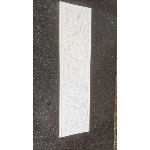 463 - A decorative white painted overmantel plaque with carved scrolls and figures, 150cm x 38cm
Location:... 