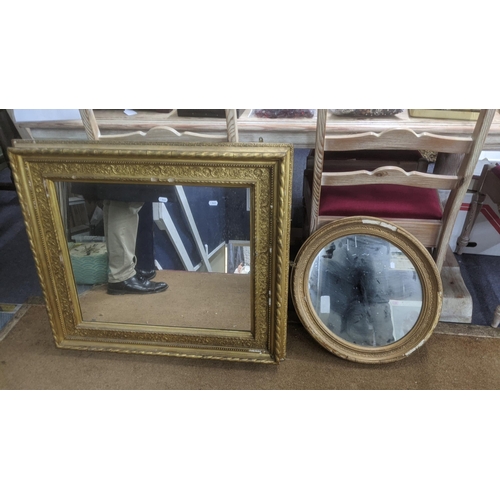 474 - An early 20th century moulded gilt framed mirror 74cm x 83.5cm together with a circular mirror in a ... 