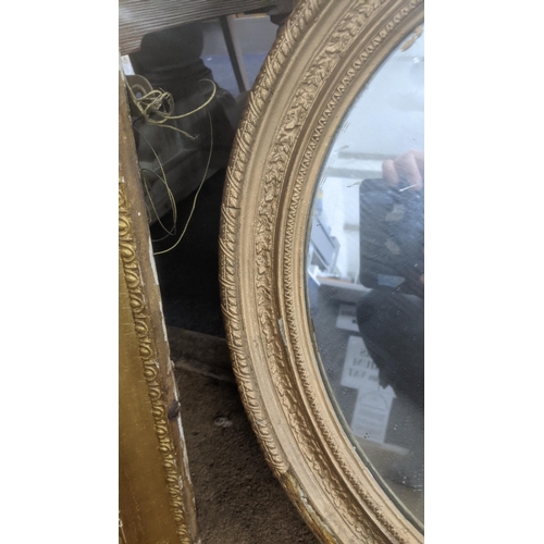 474 - An early 20th century moulded gilt framed mirror 74cm x 83.5cm together with a circular mirror in a ... 