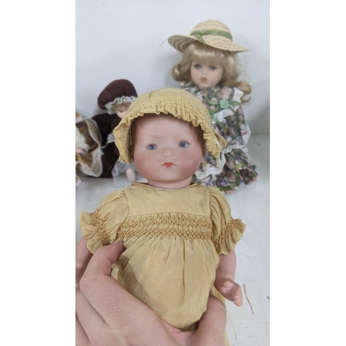 484 - Dolls to include two Armand Marseille examples, both with bisque head, sleeping blue eyes, painted f... 