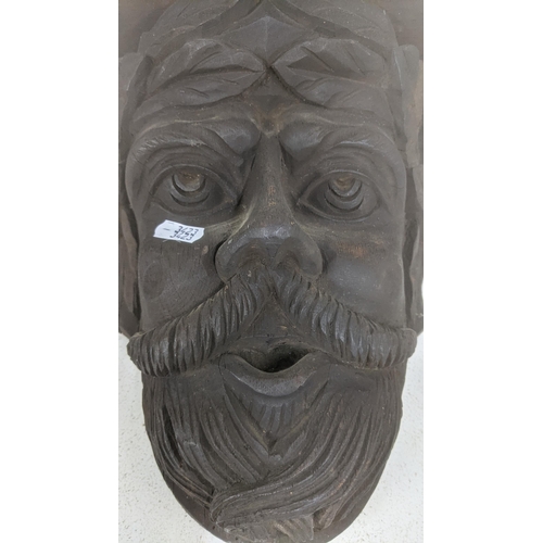 485 - A 19th century Continental carved wall bracket in the form of a face of a man, 30cm
Location:A1B
If ... 