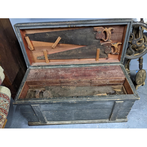 333 - A vintage wooden tool chest containing various woodworking tools, and a cast iron American drill Loc... 