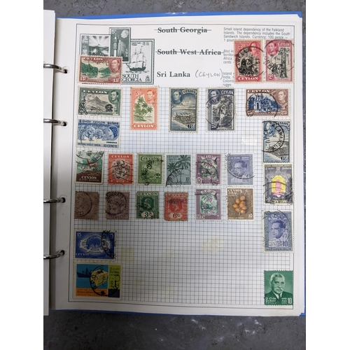 336 - A collection of worldwide stamps mounted in nine albums to include GB stamps, Chinese, Norwegian, Sp... 