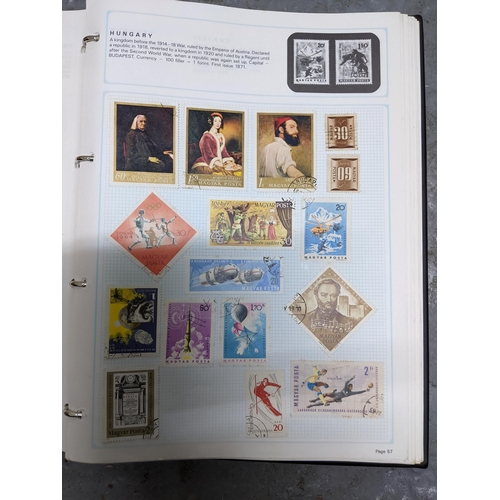 336 - A collection of worldwide stamps mounted in nine albums to include GB stamps, Chinese, Norwegian, Sp... 