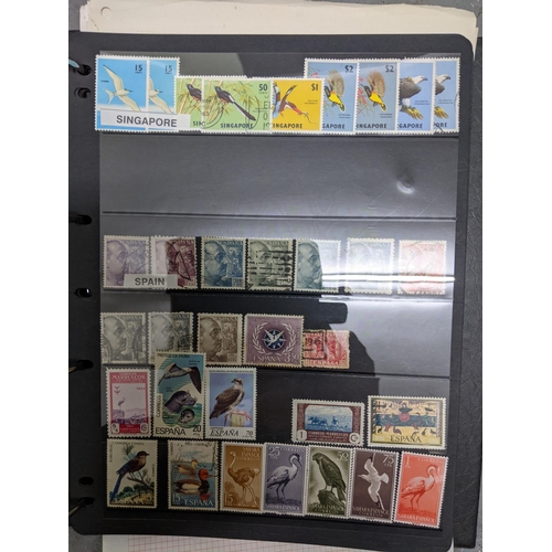 336 - A collection of worldwide stamps mounted in nine albums to include GB stamps, Chinese, Norwegian, Sp... 