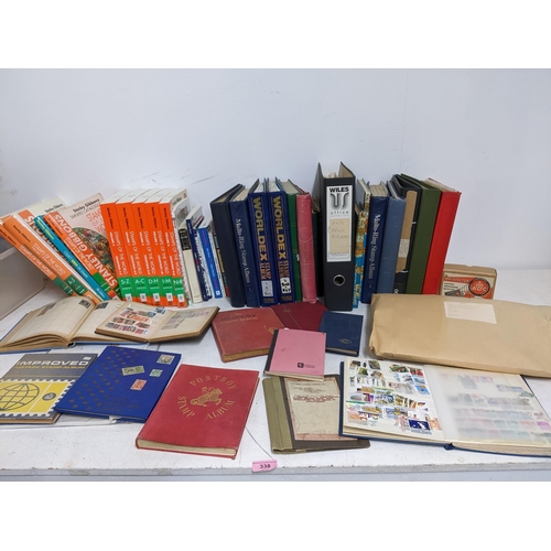 338 - A quantity of stamps from around the world mounted in various albums, some loose, along with various... 