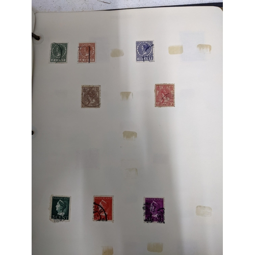 338 - A quantity of stamps from around the world mounted in various albums, some loose, along with various... 