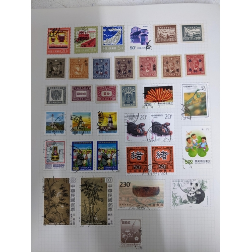 338 - A quantity of stamps from around the world mounted in various albums, some loose, along with various... 