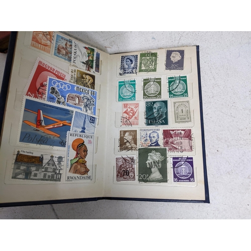 338 - A quantity of stamps from around the world mounted in various albums, some loose, along with various... 