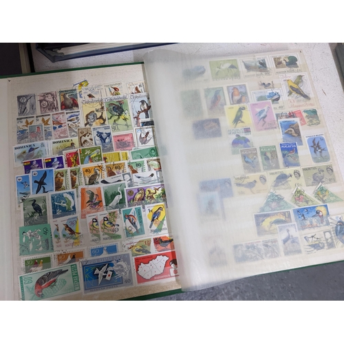 338 - A quantity of stamps from around the world mounted in various albums, some loose, along with various... 